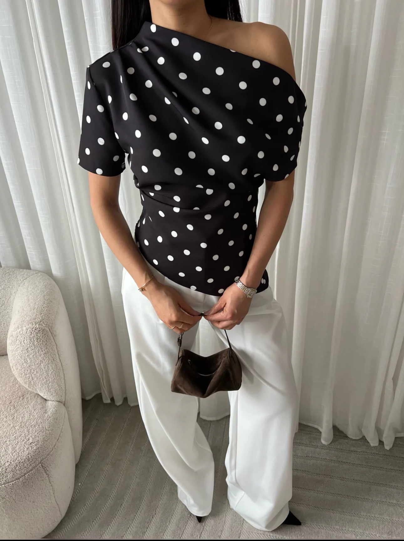 Polka dott draped one shoulder top in black