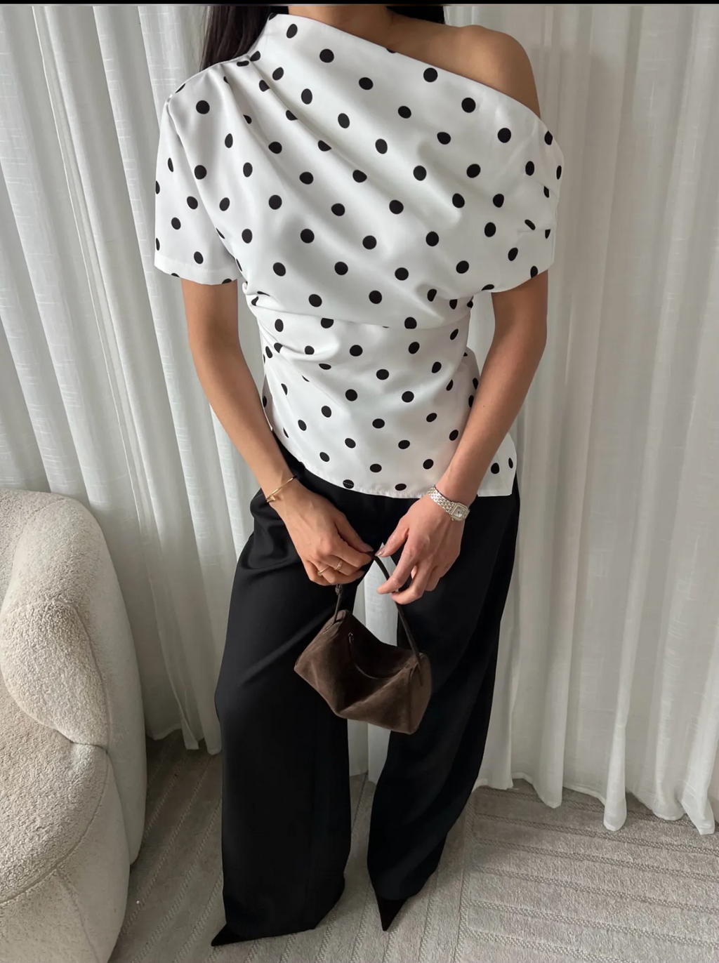 Polka dott draped one shoulder top in white